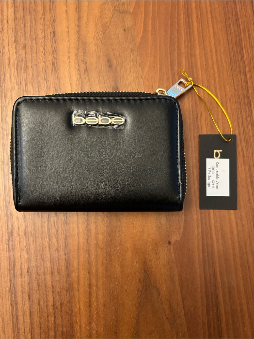 bebe Black Zip-Around Wallet with Gold Logo